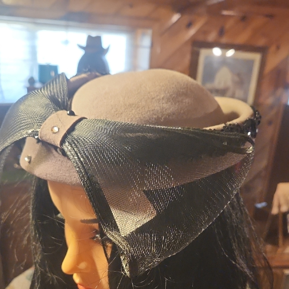 Elegant Tan Hat with Black Mesh Bow